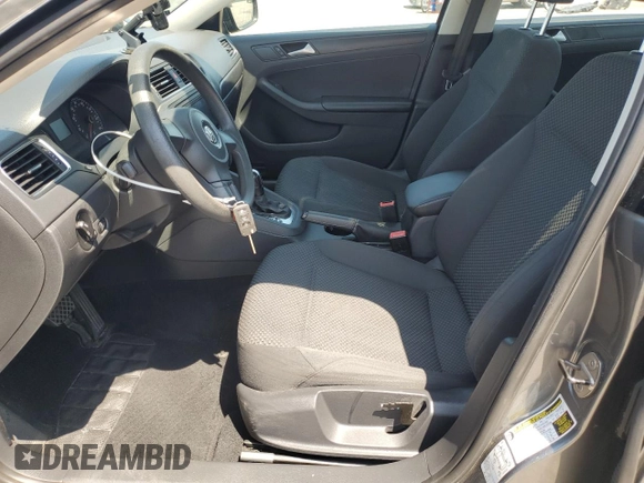 2014 Volkswagen Jetta S with VIN 3VW2K7AJXEM227412, listed as a Copart auction lot 61509275 with 116,827 mi miles and Salvage title. Bid and sale history available at DreamBid. Image 7.