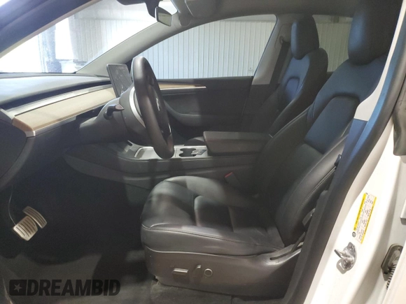 2022 Tesla Model Y Performance with VIN 7SAYGDEF7NF520825, listed as a Copart auction lot 57400245 with 55,437 mi miles and Salvage title. Bid and sale history available at DreamBid. Image 7.