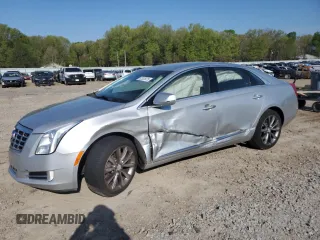 2013 Cadillac XTS Luxury with VIN 2G61P5S34D9100119, listed as a Copart auction lot 52525975 with 153,977 mi miles and Clean Title. Bid and sale history available at carsss.com. Image 1.