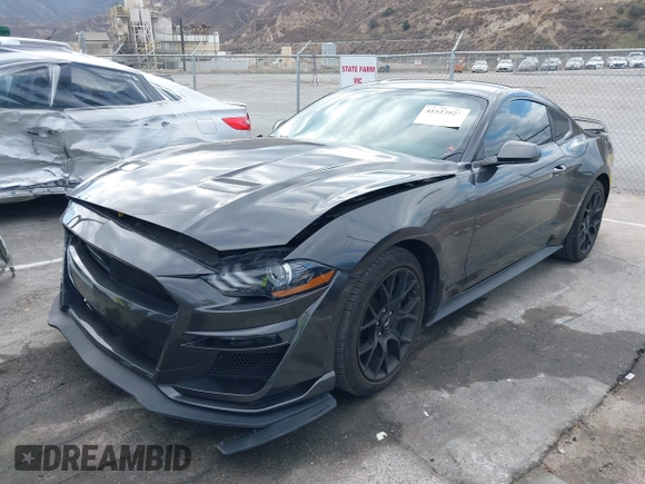 2018 Ford Mustang EcoBoost z VIN 1FA6P8THXJ5154523, wystawiony jako IAAI lot #41523923 z przebiegiem 94 330 mil mil oraz . Historia ofert i sprzedaży dostępna na DreamBid. Obrazek 18.