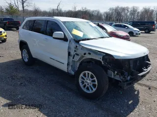 2018 Jeep Grand Cherokee Laredo E with VIN 1C4RJEAG3JC300760, listed as a IAAI auction lot 41811734 with 131,406 mi miles. Bid and sale history available at carsss.com. Image 1.