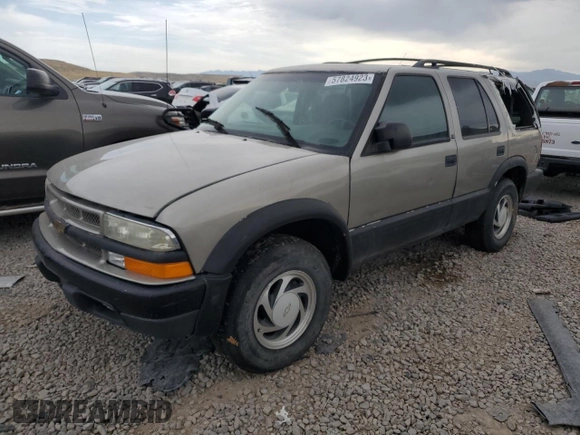 1999 Chevrolet Blazer Trailblazer z VIN 1GNDT13W9X2238417, wystawiony jako Copart lot #80087223 z przebiegiem Nie podano mil oraz Szkoda całkowita • Salvage title. Historia ofert i sprzedaży dostępna na DreamBid. Obrazek 1.