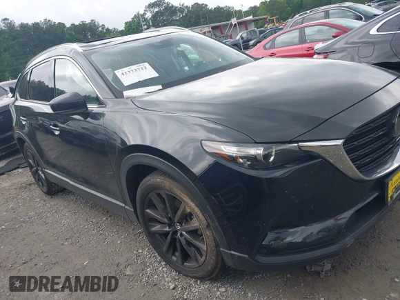 2022 Mazda CX-9 Touring Plus z VIN JM3TCBAY2N0619279, wystawiony jako IAAI lot #42373722 z przebiegiem 43 540 mil mil oraz . Historia ofert i sprzedaży dostępna na DreamBid. Obrazek 1.