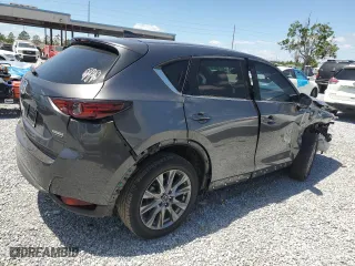 2021 Mazda CX-5 Grand Touring with VIN JM3KFADMXM1300565, listed as a Copart auction lot 53003705 with 40,911 mi miles and Non Repairable. Bid and sale history available at carsss.com. Image 3.