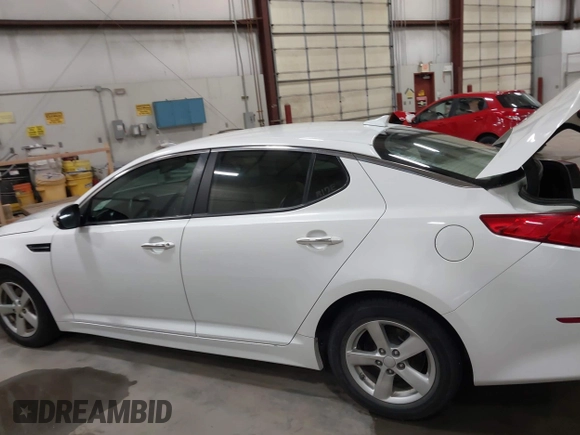 2015 Kia Optima LX with VIN KNAGM4A74F5587995, listed as a IAAI auction lot 41974745 with 206,627 mi miles. Bid and sale history available at carsss.com. Image 14.