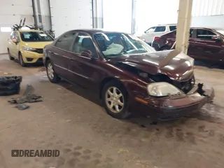 2001 Mercury Sable z VIN 1MEFM53U51G617136, wystawiony jako IAAI lot #41835763 z przebiegiem 178 343 mil mil oraz . Historia ofert i sprzedaży dostępna na DreamBid. Obrazek 1.