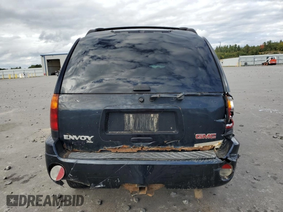 2004 GMC Envoy XL SLE with VIN 1GKET16S346179704, listed as a Copart auction lot 73719084 with 0 mi miles and Salvage Title. Bid and sale history available at carsss.com. Image 6.