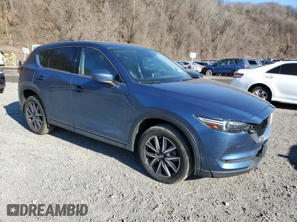 2018 Mazda CX-5 Grand Touring with VIN JM3KFBDM7J0424655, listed as a Copart auction lot 50813275 with 79,294 mi miles and Salvage Title. Bid and sale history available at DreamBid. Image 4.