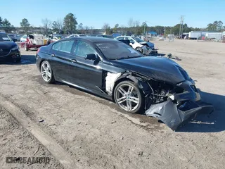 2014 BMW 6 Series 640i xDrive with VIN WBA6B8C58ED452883, listed as a IAAI auction lot 41445372 with 55,639 mi miles. Bid and sale history available at carsss.com. Image 1.