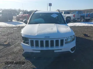 2014 Jeep Compass Altitude with VIN 1C4NJCBA4ED775315, listed as a IAAI auction lot 41429259 with 148,064 mi miles. Bid and sale history available at carsss.com. Image 13.