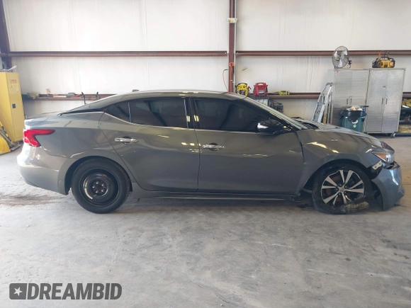 2017 Nissan Maxima SV with VIN 1N4AA6AP1HC427784, listed as a IAAI auction lot 41533604 with 111,295 mi miles and . Bid and sale history available at DreamBid. Image 13.