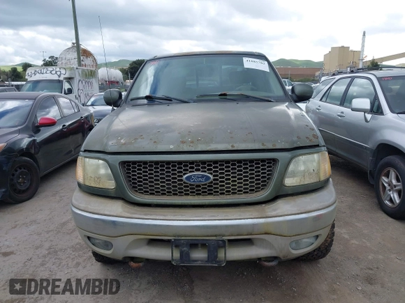 2003 Ford F-150 XLT with VIN 1FTRW08L43KC83824, listed as a IAAI auction lot 41885702 with 242,195 mi miles. Bid and sale history available at carsss.com. Image 12.