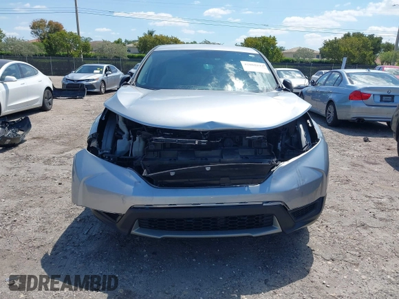 2019 Honda CR-V LX with VIN 2HKRW5H31KH411771, listed as a IAAI auction lot 42060193 with 175,036 mi miles and . Bid and sale history available at DreamBid. Image 6.