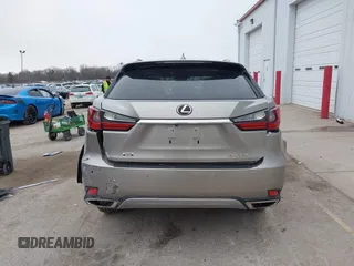 2021 Lexus RX with VIN 2T2HZMDA4MC305057, listed as a IAAI auction lot 41706486 with 37,518 mi miles. Bid and sale history available at carsss.com. Image 17.