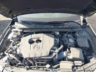 2023 Mazda 3 S Select with VIN 3MZBPABM2PM373880, listed as a IAAI auction lot 41702395 with 20,637 mi miles and . Bid and sale history available at DreamBid. Image 10.