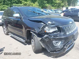 2015 Jeep Grand Cherokee Overland z VIN 1C4RJFCG9FC890294, wystawiony jako IAAI lot #42473991 z przebiegiem 168 847 mil mil oraz . Historia ofert i sprzedaży dostępna na DreamBid. Obrazek 1.