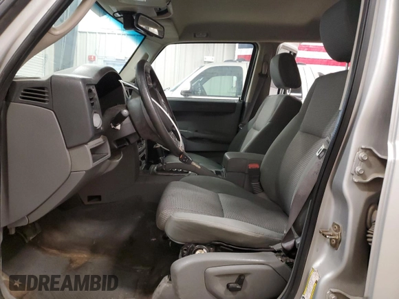 2006 Jeep Commander with VIN 1J8HG48N86C275203, listed as a Copart auction lot 57827085 with 197,552 mi miles and Clean title. Bid and sale history available at DreamBid. Image 7.