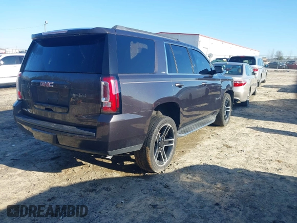 2017 GMC Yukon SLE with VIN 1GKS1AKC6HR343149, listed as a IAAI auction lot 41475728 with 102,508 mi miles. Bid and sale history available at carsss.com. Image 4.