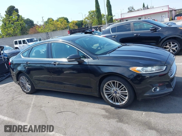 2015 Ford Fusion SE with VIN 3FA6P0HDXFR195603, listed as a IAAI auction lot 42761373 with 105,719 mi miles and . Bid and sale history available at DreamBid. Image 13.