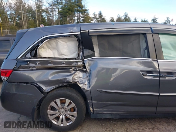 2014 Honda Odyssey EX-L with VIN 5FNRL5H67EB073640, listed as a IAAI auction lot 41115124 with 99,841 mi miles and . Bid and sale history available at carsss.com. Image 19.