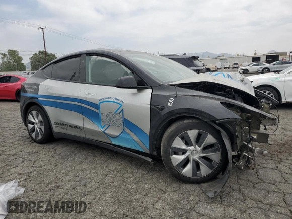 2024 Tesla Model Y Long Range with VIN 7SAYGDEE8RA238798, listed as a Copart auction lot 54401175 with Not provided miles and Salvage title. Bid and sale history available at DreamBid. Image 4.