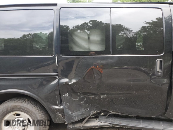 2015 Chevrolet Express Passenger LS with VIN 1GAWGPFG0F1141701, listed as a Copart auction lot 62818685 with 63,219 mi miles and Salvage title. Bid and sale history available at DreamBid. Image 11.
