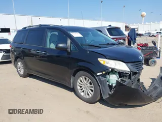 2014 Toyota Sienna XLE with VIN 5TDYK3DC2ES492554, listed as a IAAI auction lot 41685109 with 196,619 mi miles. Bid and sale history available at carsss.com. Image 1.