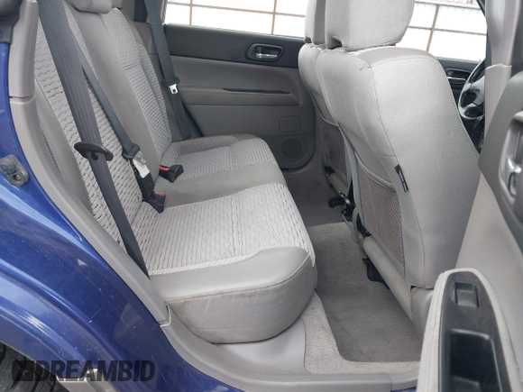 2003 Subaru Forester XS with VIN JF1SG65643H715427, listed as a IAAI auction lot 41935620 with 248,726 mi miles. Bid and sale history available at carsss.com. Image 8.