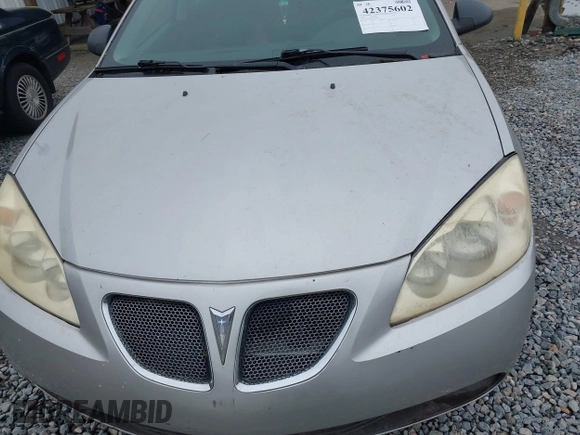 2006 Pontiac G6 6-Cyl z VIN 1G2ZG558464228524, wystawiony jako IAAI lot #42375602 z przebiegiem 172 972 mil mil oraz . Historia ofert i sprzedaży dostępna na DreamBid. Obrazek 10.