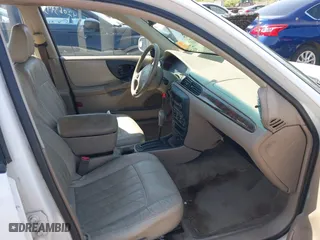 2003 Chevrolet Malibu LS with VIN 1G1NE52J13M538299, listed as a IAAI auction lot 42051511 with 213,853 mi miles. Bid and sale history available at carsss.com. Image 5.