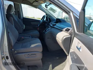 2016 Honda Odyssey SE with VIN 5FNRL5H32GB153002, listed as a IAAI auction lot 42084022 with 63,764 mi miles and . Bid and sale history available at DreamBid. Image 5.
