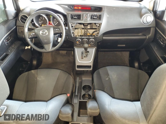 2014 Mazda 5 Sport with VIN JM1CW2BL9E0163445, listed as a Copart auction lot 64772215 with 86,020 mi miles and Salvage title. Bid and sale history available at DreamBid. Image 8.