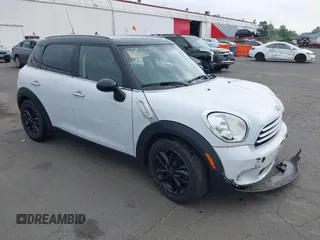 2012 MINI Countryman z VIN WMWZB3C57CWM04258, wystawiony jako IAAI lot #42116867 z przebiegiem 168 550 mil mil oraz . Historia ofert i sprzedaży dostępna na DreamBid. Obrazek 1.