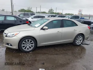 2014 Chevrolet Malibu LT with VIN 1G11E5SL2EF127596, listed as a IAAI auction lot 41904216 with 180,329 mi miles and . Bid and sale history available at DreamBid. Image 14.