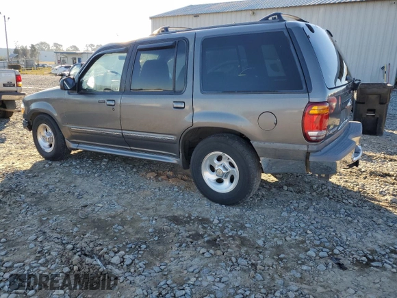 1999 Ford Explorer XL with VIN 1FMZU34X8XUC31019, listed as a Copart auction lot 87831635 with 220,683 mi miles and Salvage title. Bid and sale history available at DreamBid. Image 2.
