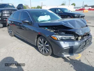 2023 Honda Civic Sedan EX with VIN 2HGFE1F70PH312235, listed as a IAAI auction lot 41604942 with 29,724 mi miles. Bid and sale history available at carsss.com. Image 1.