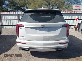 2021 Cadillac XT6 Premium Luxury z VIN 1GYKPCRS6MZ230499, wystawiony jako IAAI lot #41808404 z przebiegiem 86 933 mil mil oraz . Historia ofert i sprzedaży dostępna na DreamBid. Obrazek 17.
