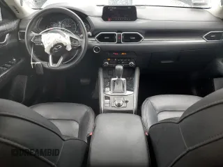 2020 Mazda CX-5 Grand Touring with VIN JM3KFADM3L0815055, listed as a Copart auction lot 48175245 with 56,602 mi miles and Salvage Title. Bid and sale history available at carsss.com. Image 8.