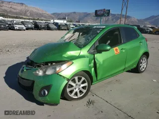 2012 Mazda Mazda2 Touring with VIN JM1DE1LY4C0131303, listed as a Copart auction lot 74291414 with 97,964 mi miles and Salvage Title. Bid and sale history available at carsss.com. Image 1.
