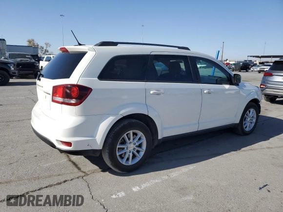 2017 Dodge Journey SXT with VIN 3C4PDCBG7HT531547, listed as a Copart auction lot 52322685 with 121,876 mi miles and Salvage title. Bid and sale history available at DreamBid. Image 3.