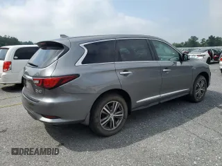 2020 Infiniti QX60 Luxe with VIN 5N1DL0MM4LC512641, listed as a Copart auction lot 63790245 with 101,694 mi miles and Salvage title. Bid and sale history available at DreamBid. Image 3.