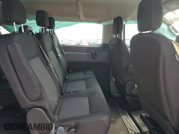 2023 Ford Transit Passenger XL с VIN 1FBAX2Y82PKA53310, выставлен на аукционе Copart как лот 58484565 с пробегом Не указан миль и Списание • Salvage title. История ставок и продаж доступна на DreamBid. Изображение 11.