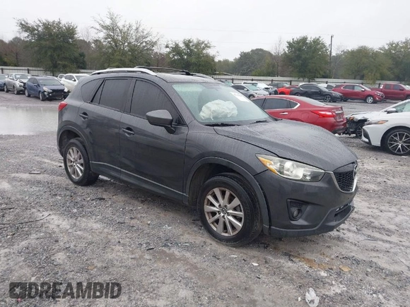 2015 Mazda CX-5 Touring with VIN JM3KE2CY4F0435563, listed as a IAAI auction lot 41311988 with 187,183 mi miles. Bid and sale history available at carsss.com. Image 1.