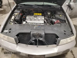 1998 Cadillac Seville STS z VIN 1G6KY5490WU916771, wystawiony jako Copart lot #58699555 z przebiegiem 129 944 mil mil oraz Nie do naprawy. Historia ofert i sprzedaży dostępna na DreamBid. Obrazek 11.
