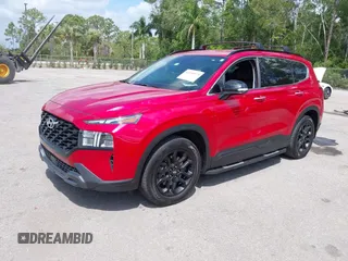 2022 Hyundai Santa Fe XRT z VIN 5NMS64AJ3NH382831, wystawiony jako IAAI lot #42100573 z przebiegiem 46 502 mil mil oraz . Historia ofert i sprzedaży dostępna na DreamBid. Obrazek 2.