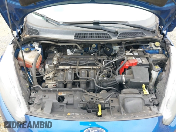 2018 Ford Fiesta SE z VIN 3FADP4BJXJM126168, wystawiony jako IAAI lot #42255261 z przebiegiem 121 248 mil mil oraz . Historia ofert i sprzedaży dostępna na DreamBid. Obrazek 10.