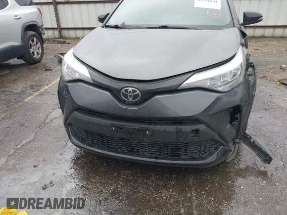 2021 Toyota C-HR LE with VIN JTNKHMBX0M1129080, listed as a IAAI auction lot 41321604 with 52,916 mi miles. Bid and sale history available at carsss.com. Image 12.