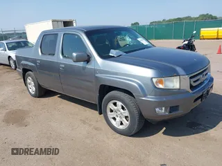 2009 Honda Ridgeline RTS z VIN 5FPYK16479B107114, wystawiony jako IAAI lot #42452199 z przebiegiem 206 853 mil mil oraz . Historia ofert i sprzedaży dostępna na DreamBid. Obrazek 1.
