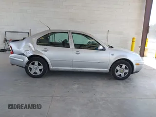 2000 Volkswagen Jetta GLS z VIN 3VWSA29M4YM195775, wystawiony jako IAAI lot #42131518 z przebiegiem 314 472 mil mil oraz . Historia ofert i sprzedaży dostępna na DreamBid. Obrazek 14.