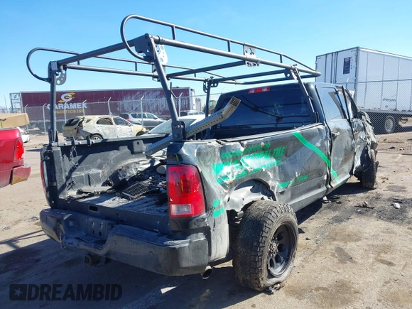 2016 Ram 2500 Tradesman with VIN 3C6UR5HJ2GG362507, listed as a IAAI auction lot 41692734 with 128,452 mi miles and . Bid and sale history available at DreamBid. Image 4.